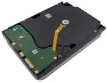 This image shows an oblique view of the back of a Seagate EXOS X18 18&nbsp;TB HDD